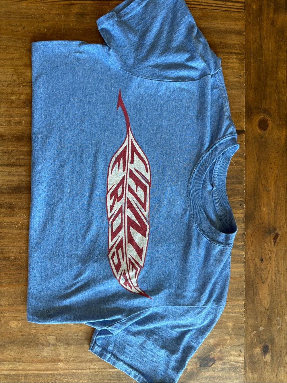 Lane Frost Graphic Tee with Red Feather Logo
